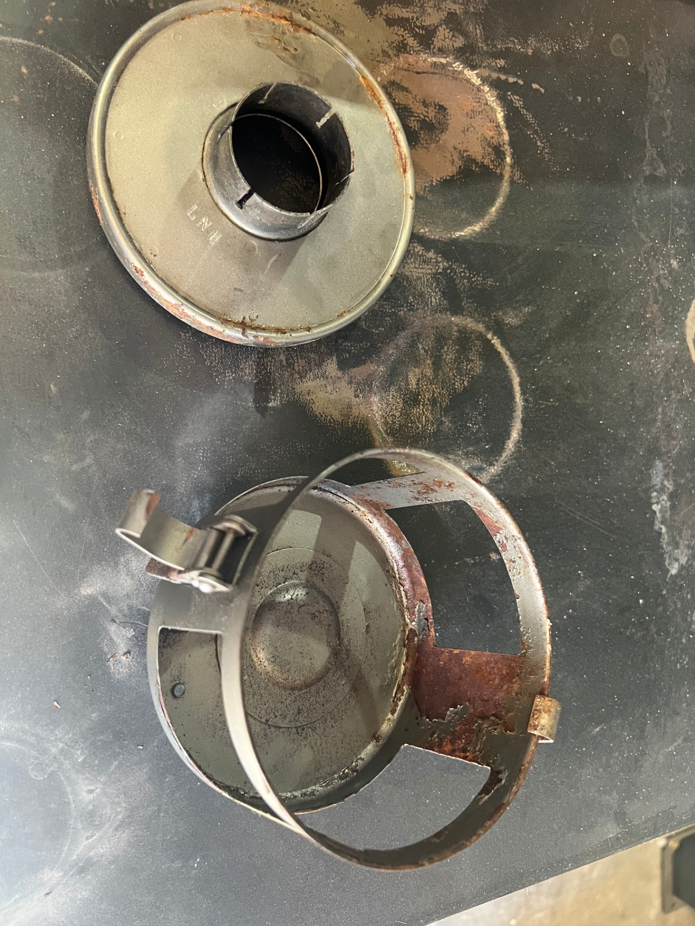 Corroded end caps stripped ready for assessment