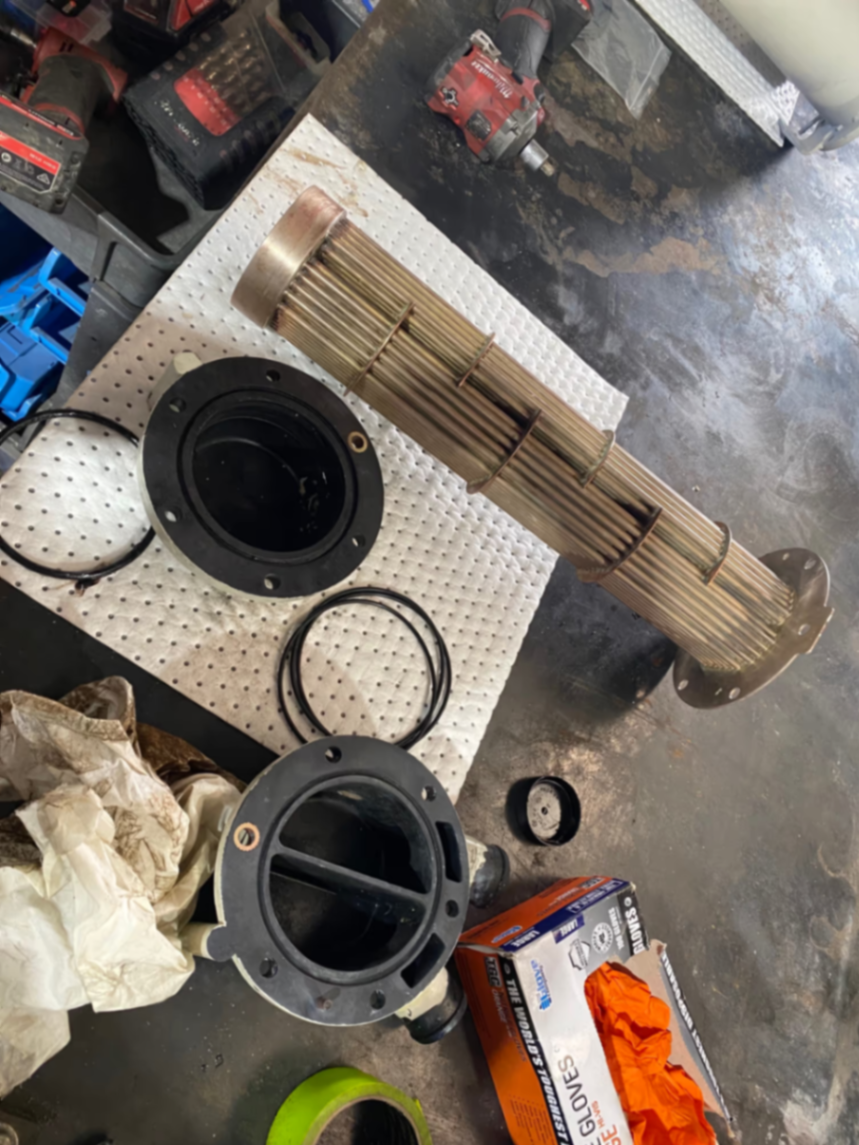 Heat exchanger tube bundle pulled out on the bench for cleaning