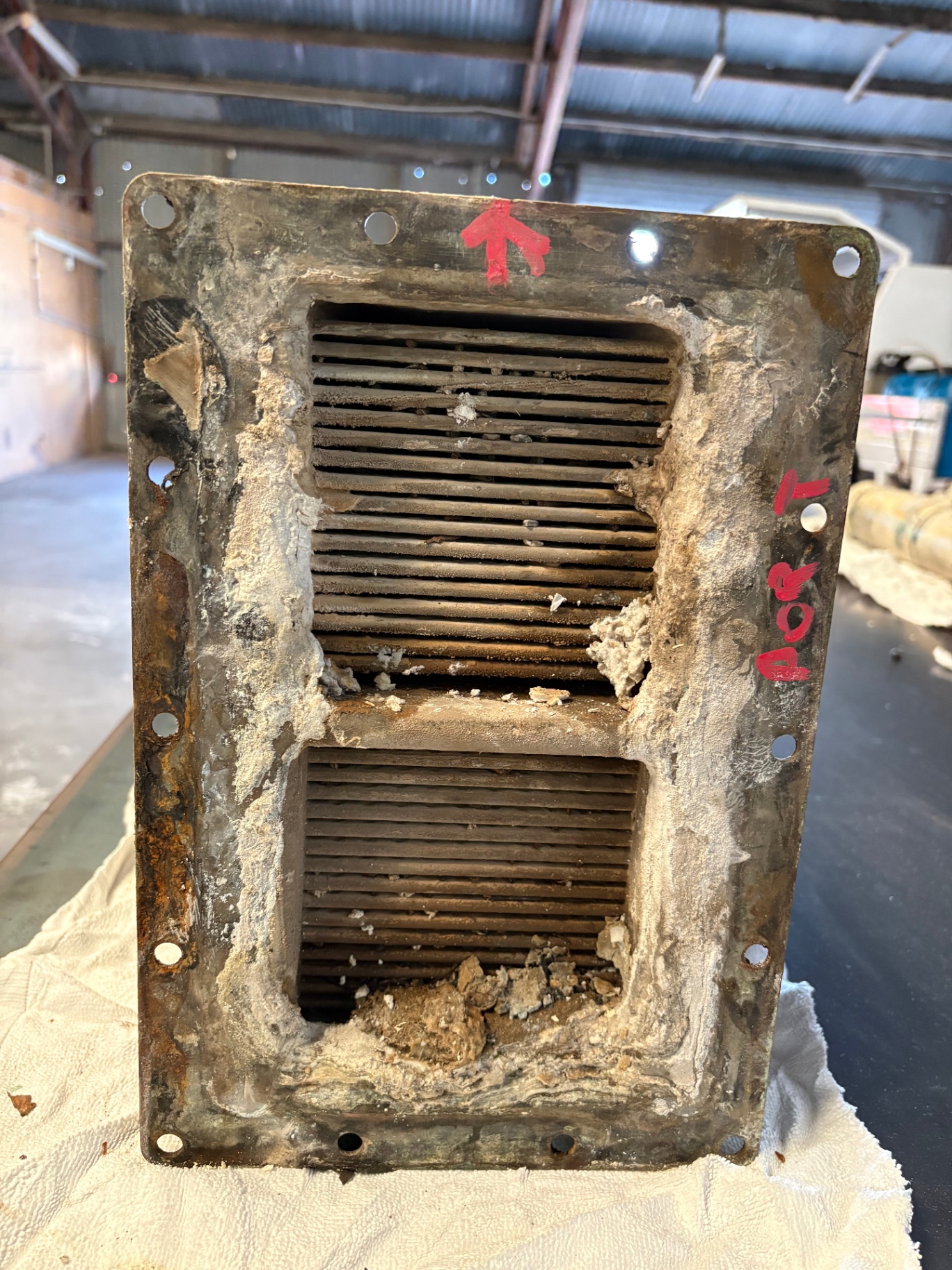 Port aftercooler removed showing heavy salt fouling and corrosion